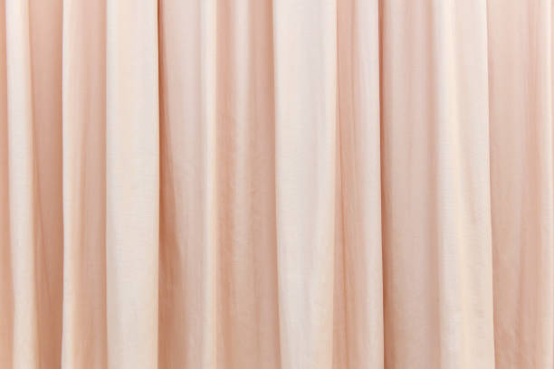 istock red curtain in the comfortable room for background 984653098