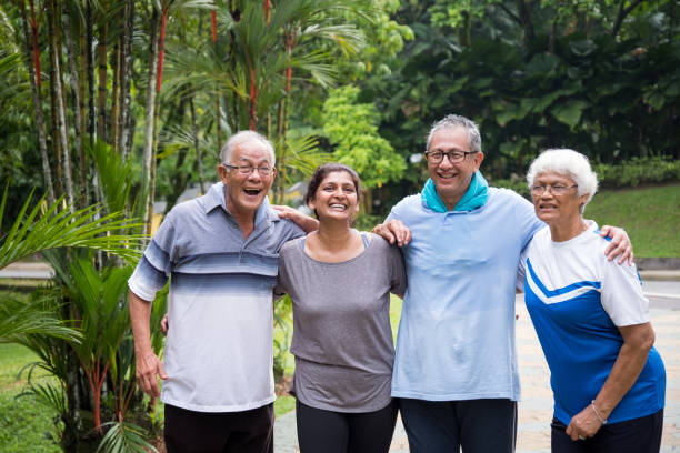 istock Group of happy active seniors in the park 984653126