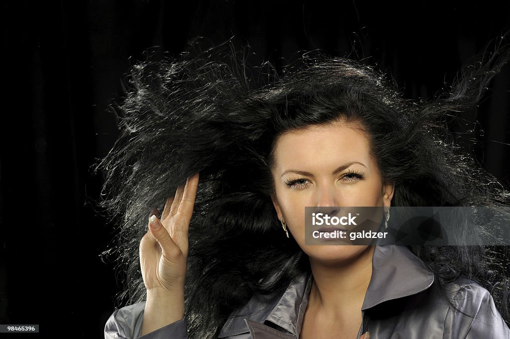 Model with beautiful long hair in motion created by wind  30-34 Years Stock Photo