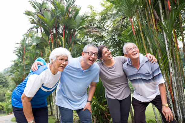 istock Group of happy active seniors in the park 984656820