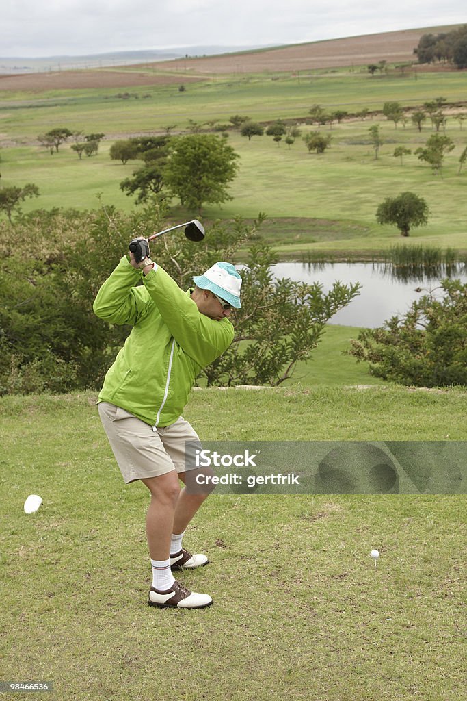 Golfer backswing  Adult Stock Photo