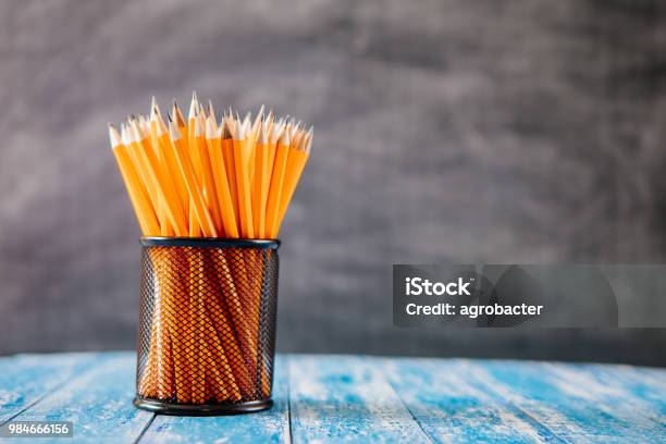 Yellow Sharp Pencil In Black Metal Basket Stock Photo - Download Image Now - Pencil, Cup, Pen