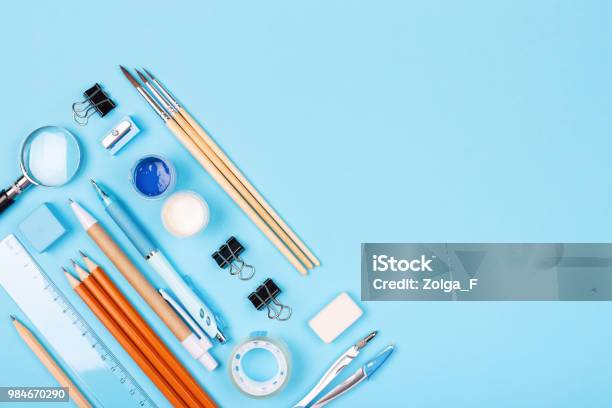 Stationary On Blue Background Stock Photo - Download Image Now - Desk, Stationary, Teacher