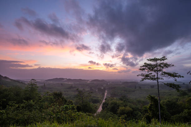 istock silhouette mountain and cloud sunrise sky 984679842