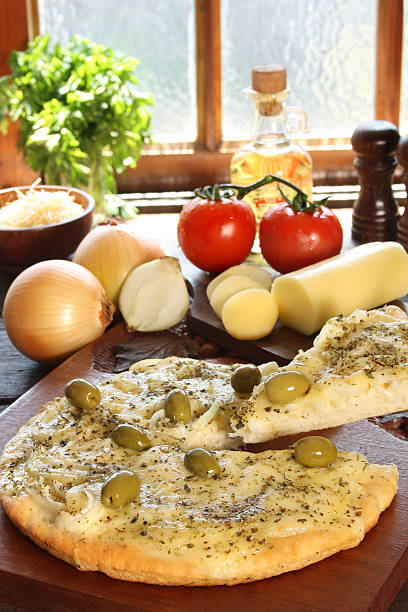 istock Onions pizza with olives and ingredientes 98468341