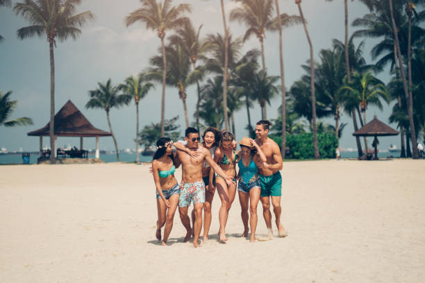 istock Friends on the beach 984689530