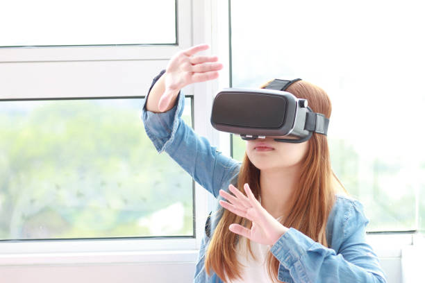 istock Young woman using tablet at home. 984691778