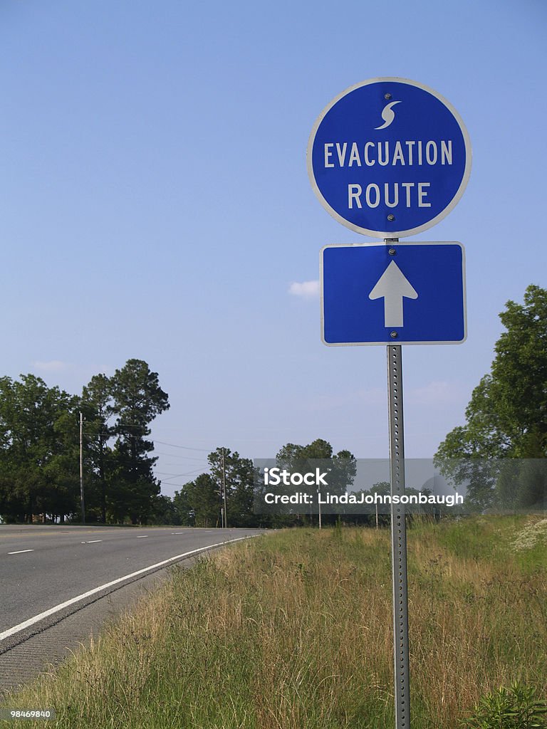 Hurricane Evacuation Route Sign Blue hurricane evacuation route sign along a highway.       Advice Stock Photo