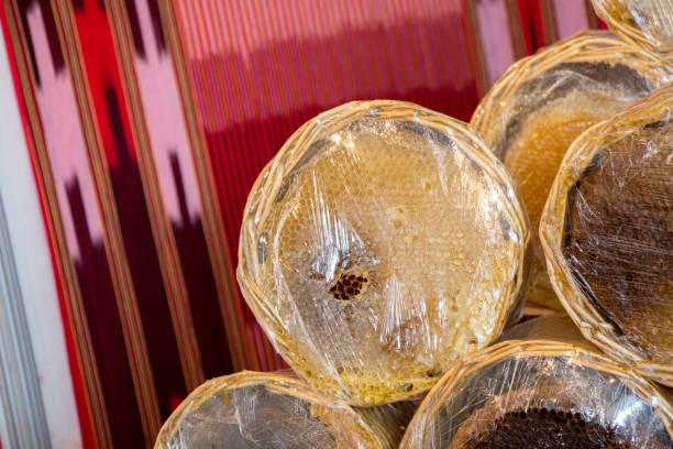 istock Fresh honey in the sealed comb frame 984707820