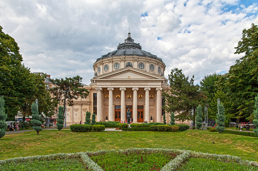 Bucharest, Romania - June 24 2018: The Romanian Athenaeum (Romanian: Ateneul Român) is a concert hall in the center of Bucharest, Romania and a landmark of the Romanian capital city.