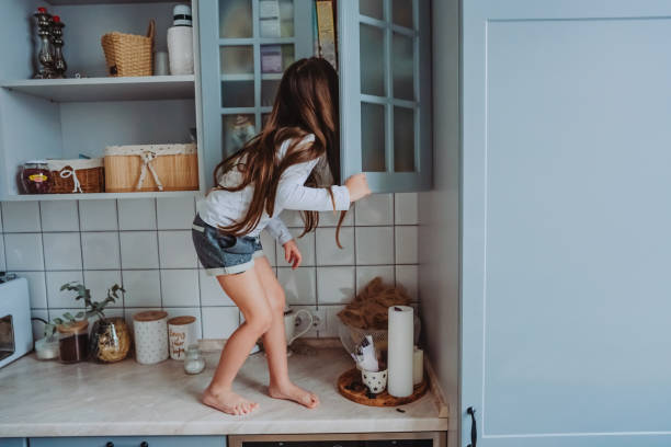 istock little girl opens the closet 984735400