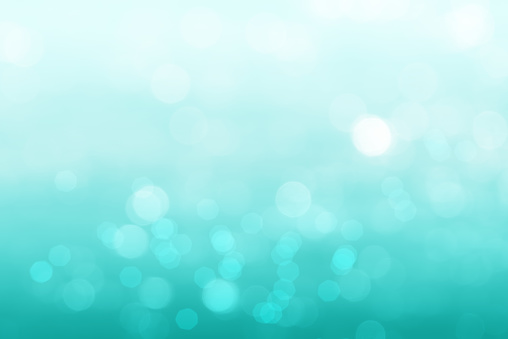 Abstract bokeh light turquoise color background.  Turquoise Bokeh light