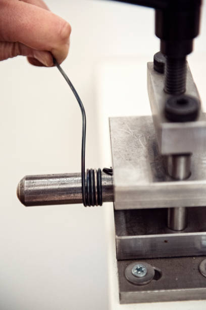 istock Silversmith Crafting a Set of Palladium Rings 984743720