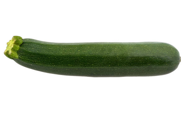 istock Fresh green zucchini, top wiew, isolated on white background 984750228