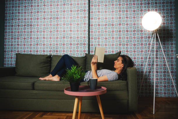 Portrait of good looking casual woman at home