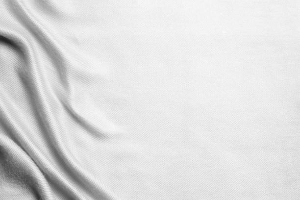 istock luxury white fabric texture ,crumpled silk or satin  background. 984757558