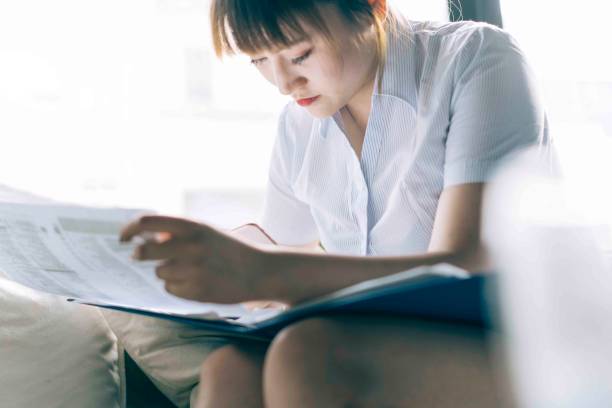 istock young woman working at home office 984762382