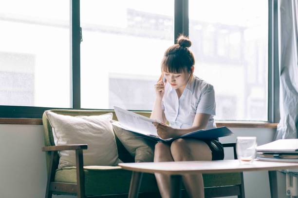 istock young businesswoman talking on phone 984762406