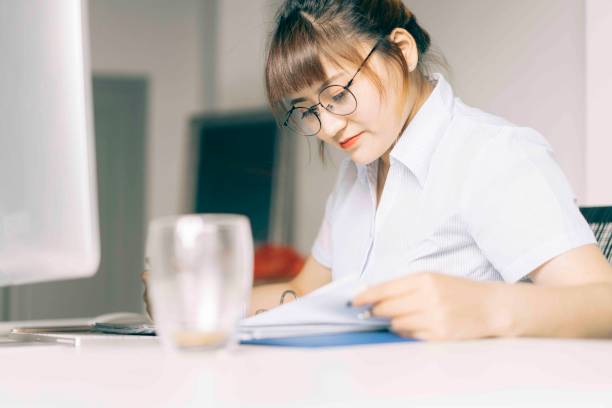 istock asian business woman working on laptop 984762532