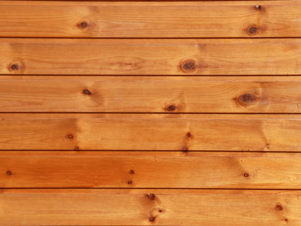 istock Light brown wooden planks as a background 984786698