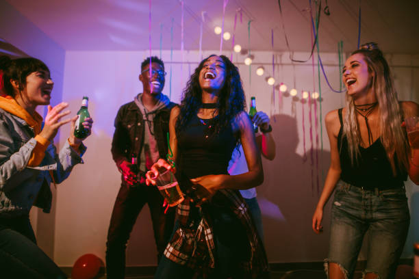 istock Friends enjoying at a house party 984790696