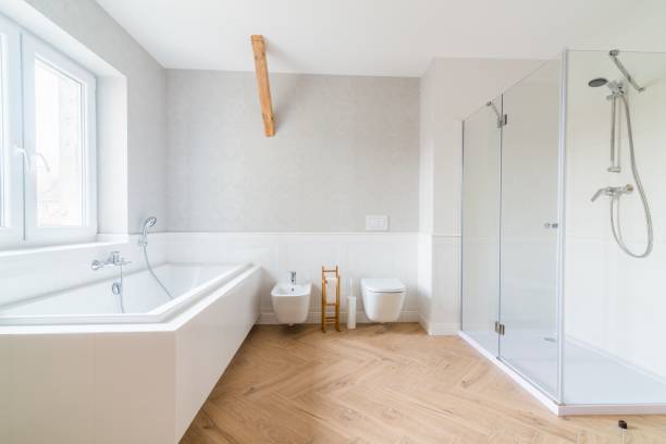 bathtub and glass shower cabin in loft bathroom. - bathroom shower glass contemporary imagens e fotografias de stock