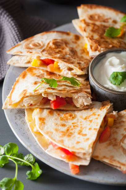 istock mexican quesadilla with chicken, tomato, sweet corn and cheese 984792214