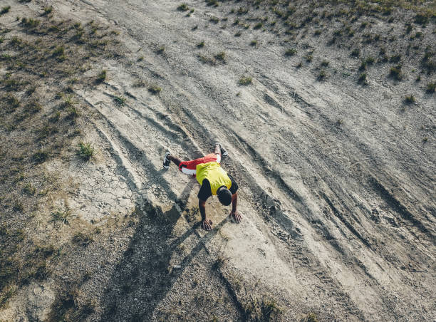 istock Male Athlete Exercising Outdoors 984792298