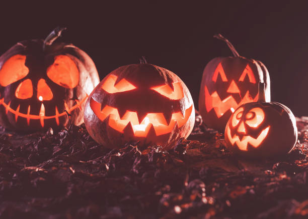 istock Halloween pumpkins at wood background 984792848