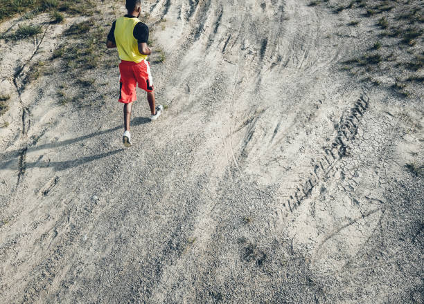 istock Male Athlete Running Outdoors 984793214