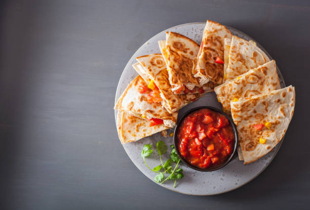 istock mexican quesadilla with chicken, tomato, sweet corn and cheese 984797384