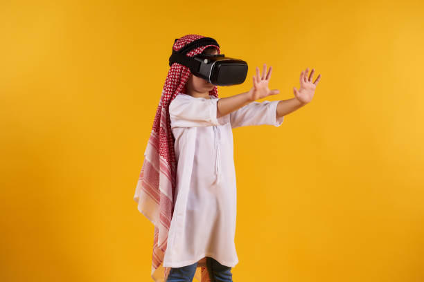 istock Arabian happy boy with virtual reality glasses 984809712