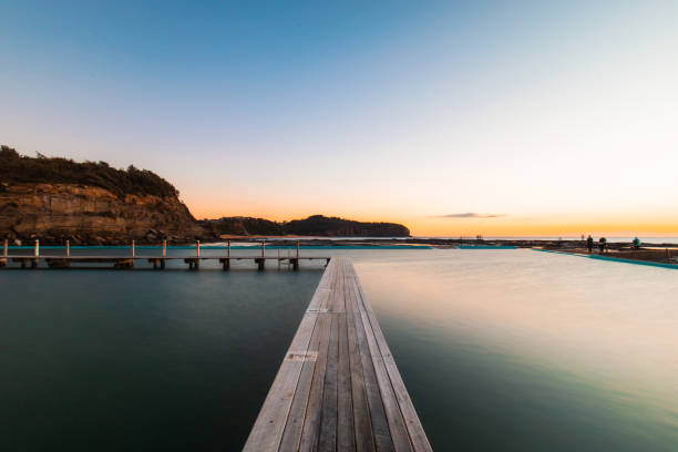 Wooden pier on the rock pool