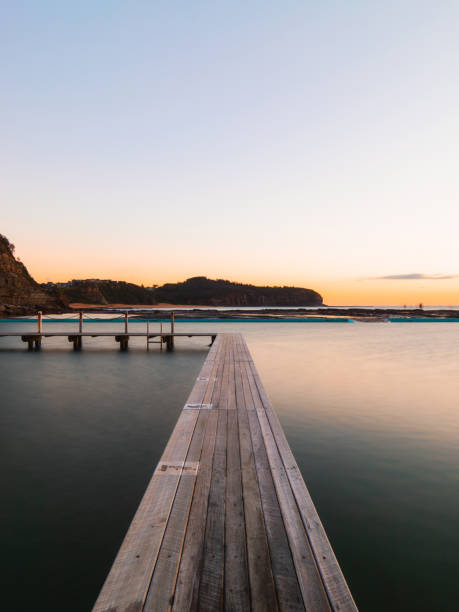 istock Wooden pier on the rock pool 984818288