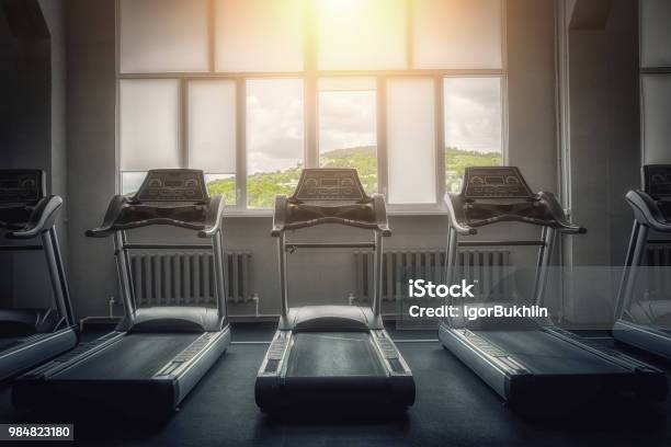 The Interior Of An Empty Gym With View Of The Picturesque Mountains Treadmill The Concept Of A Healthy Lifestyle Diet And Fat Burning Sport And Beauty Never Give Up Stock Photo - Download Image Now