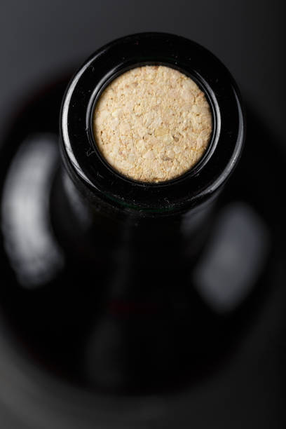 a bottle of wine closed with a cork, close-up, top view