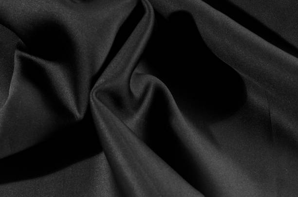 istock Texture. Background. Pattern. Black fabric for cutting clothes. Excellent evening dress, great design 984825650