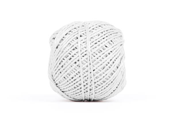 istock Small ball of rope isolated - White 984828652