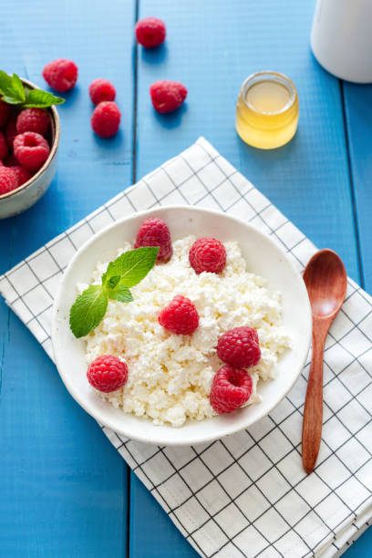 istock Tvorog, cottage cheese or ricotta with raspberries 984844322