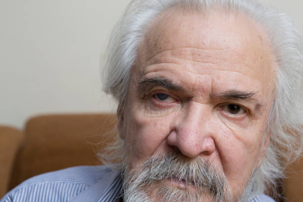 istock Lonely old man with sore eyes 984845674