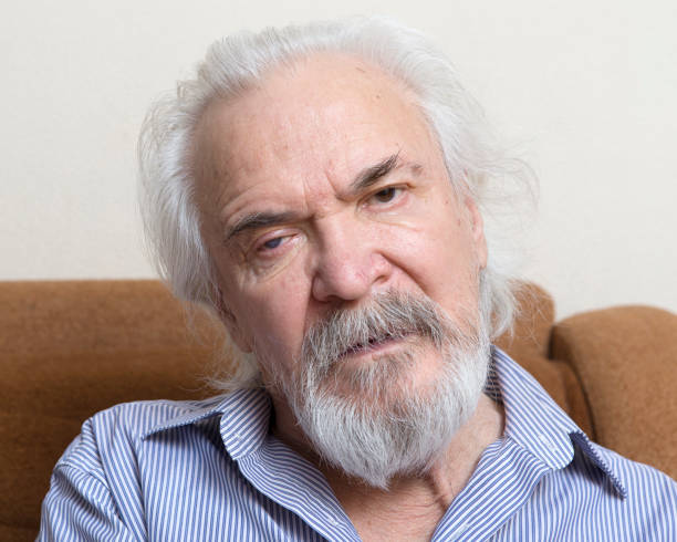 istock Lonely old man with sore eyes 984845782