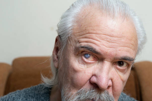 istock Lonely old man with sore eyes 984846572