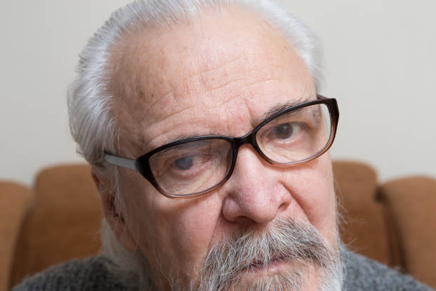 istock Lonely old man with sore eyes 984846668