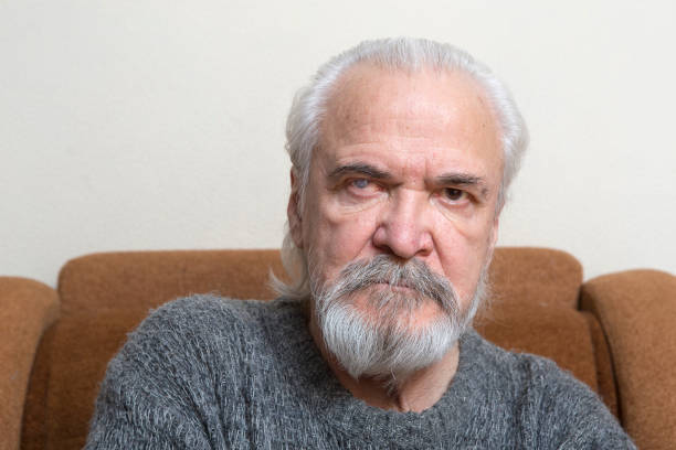 istock Lonely old man with sore eyes 984846898
