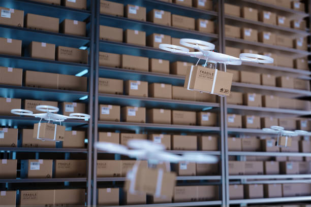 istock Drones carry express packages in warehouses.Packages are transported in high-tech Settings,online shopping,Concept of automatic logistics management.3d rendering warehouse. 984847444