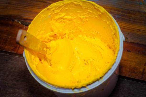 istock yellow color in white plastic barrel 984852068