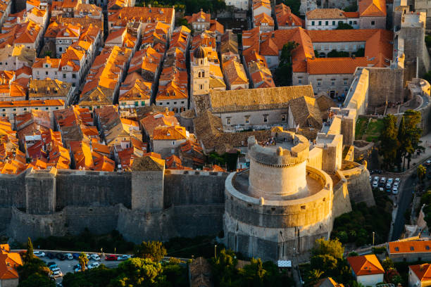 View from the top of the mountain of Srdj to Minceta Tower in the old part of the city in Dubrovnik, Croatia View from the top of the mountain of Srdj to Minceta Tower in the old part of the city in Dubrovnik, Croatia. fort minceta dubrovnik stock pictures, royalty-free photos & images