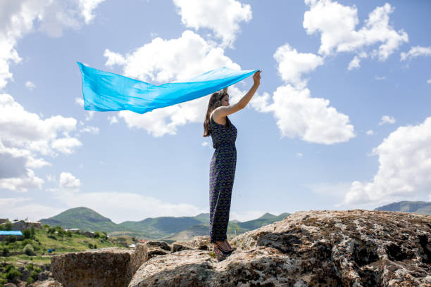 istock a young woman in the spring 984911536