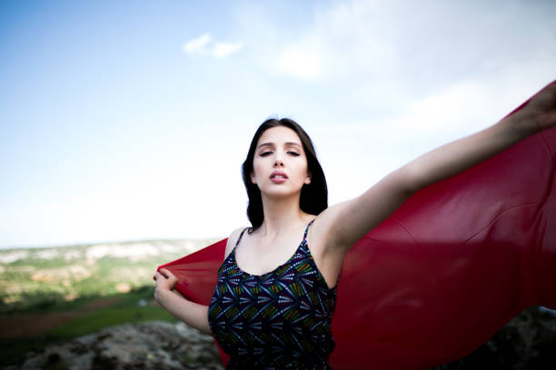 istock a young woman in the spring 984911902