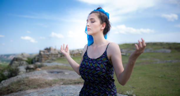 istock a young woman in the spring 984911906